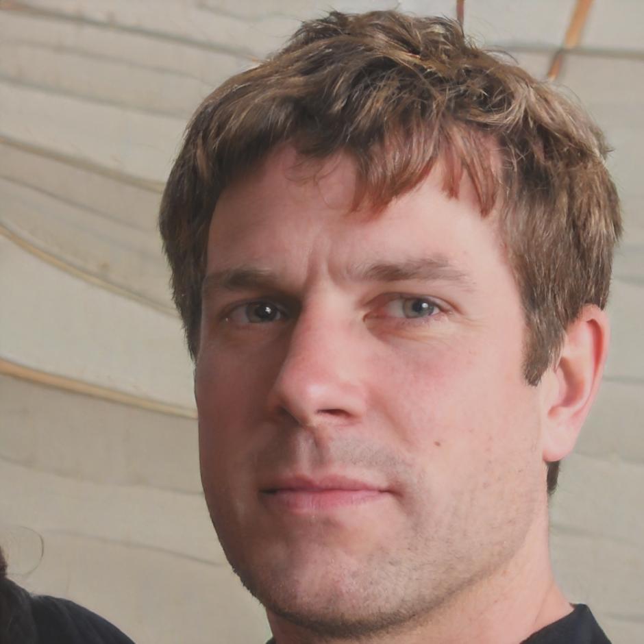 Professional headshot of community member